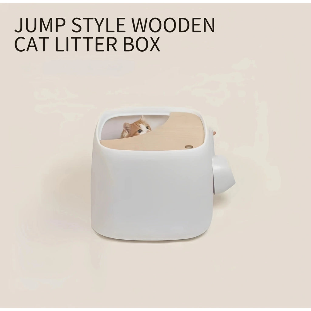 inFluffy top-entry litter box shown with its scoop beside the base