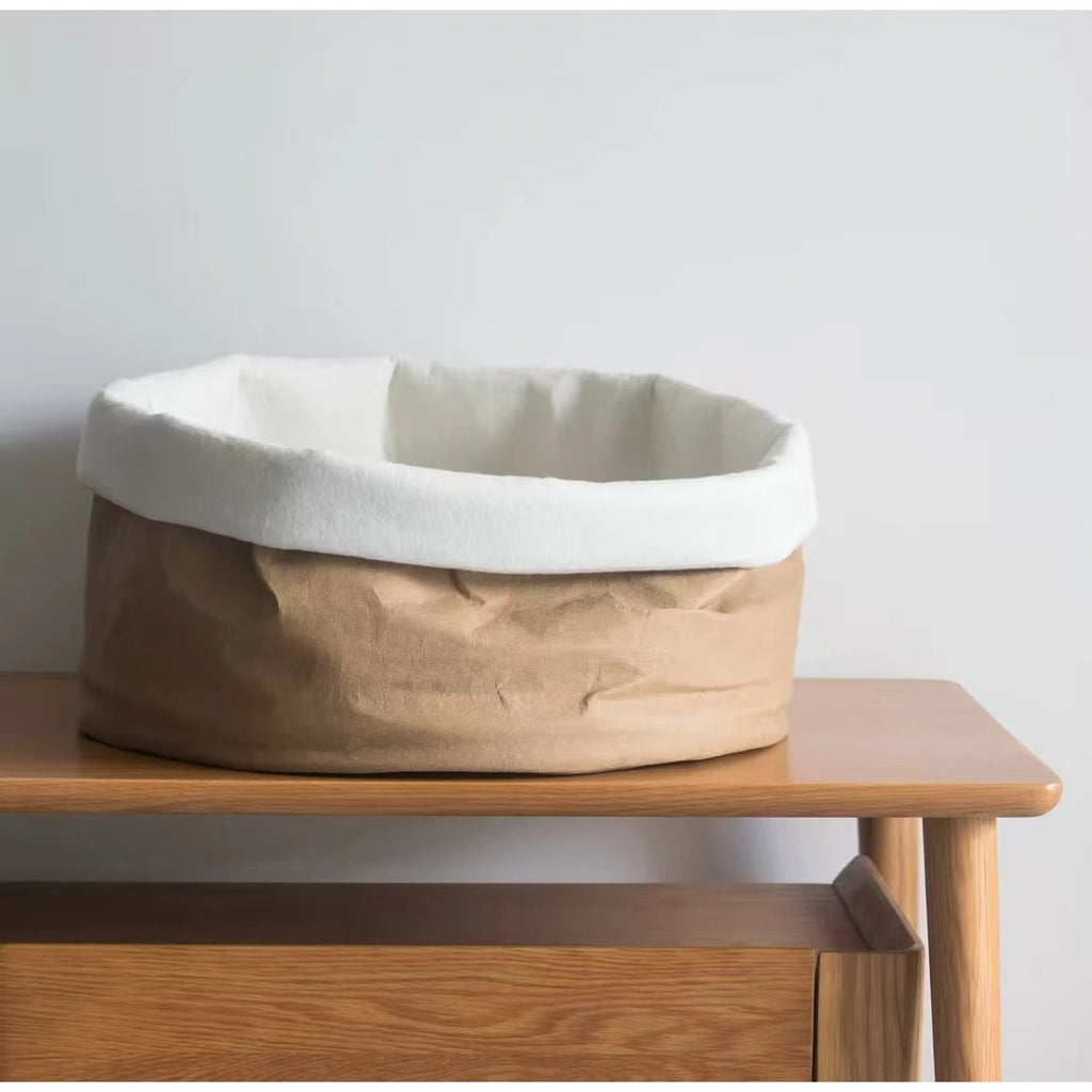 inFluffy kraft paper bed showing its folded rim