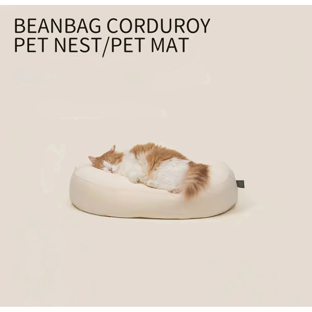 inFluffy rounded corduroy pet nest with a sleeping cat