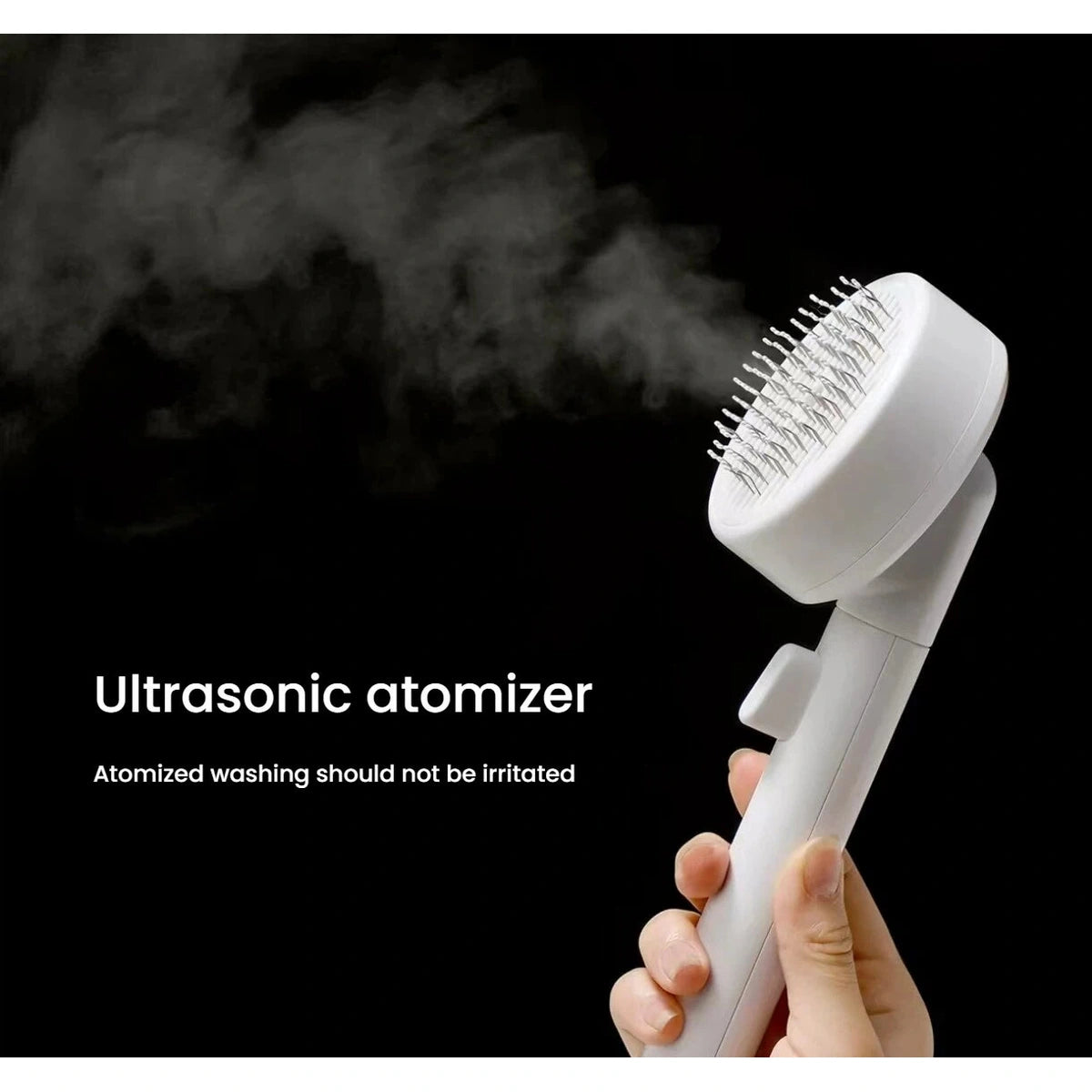 Fine mist spraying from the Miao Xiang Jia pet slicker brush