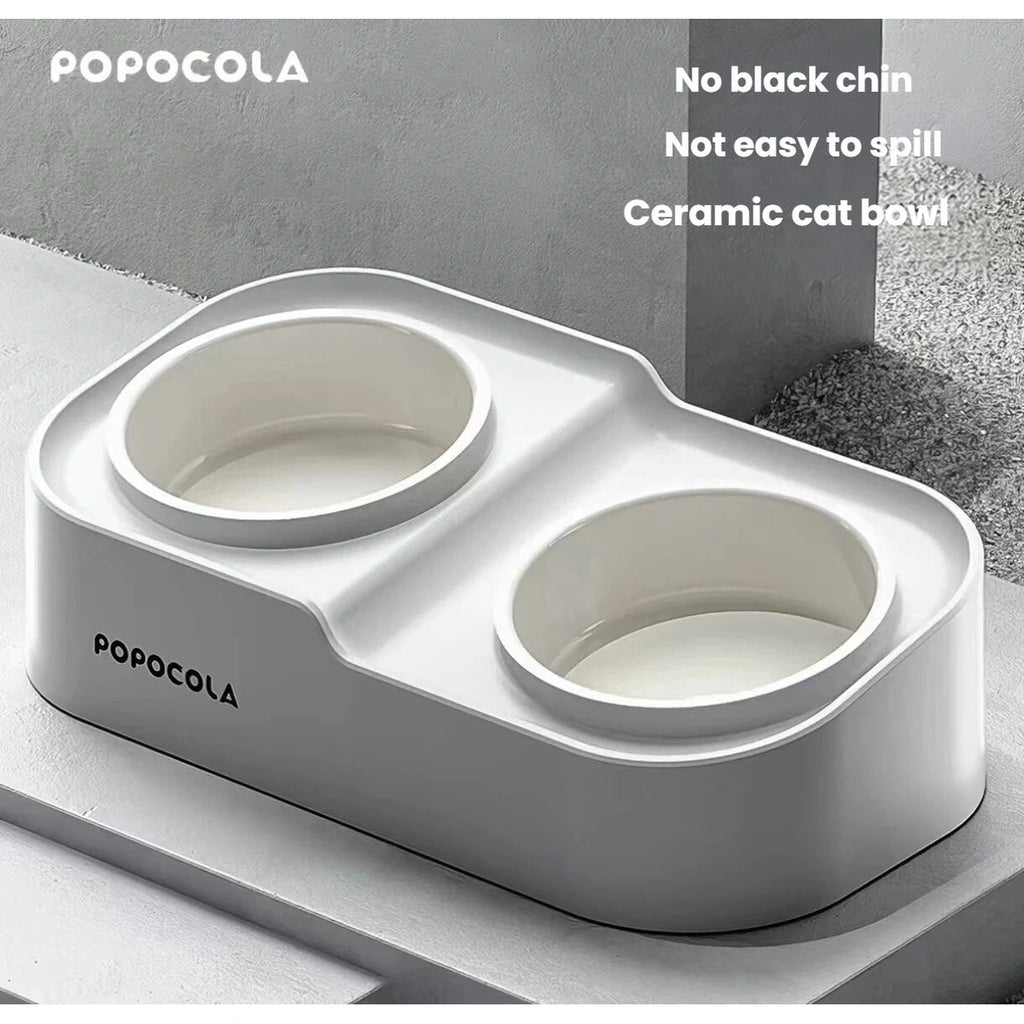 Front angled view of the Popocola raised double ceramic pet bowl