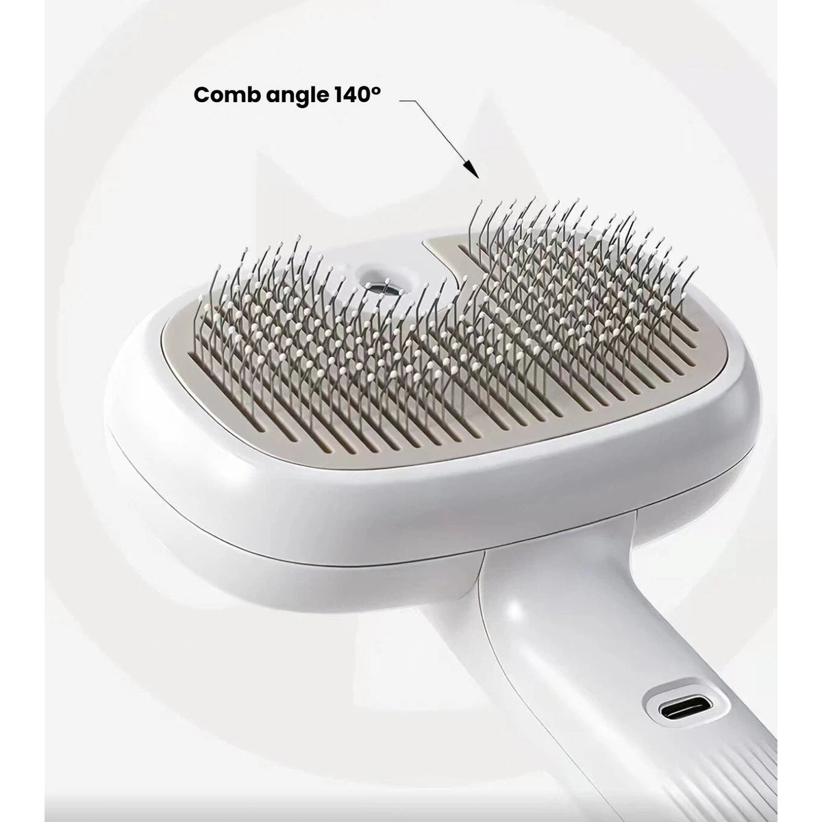Close-up of angled metal pins and charging port on the Petstar brush