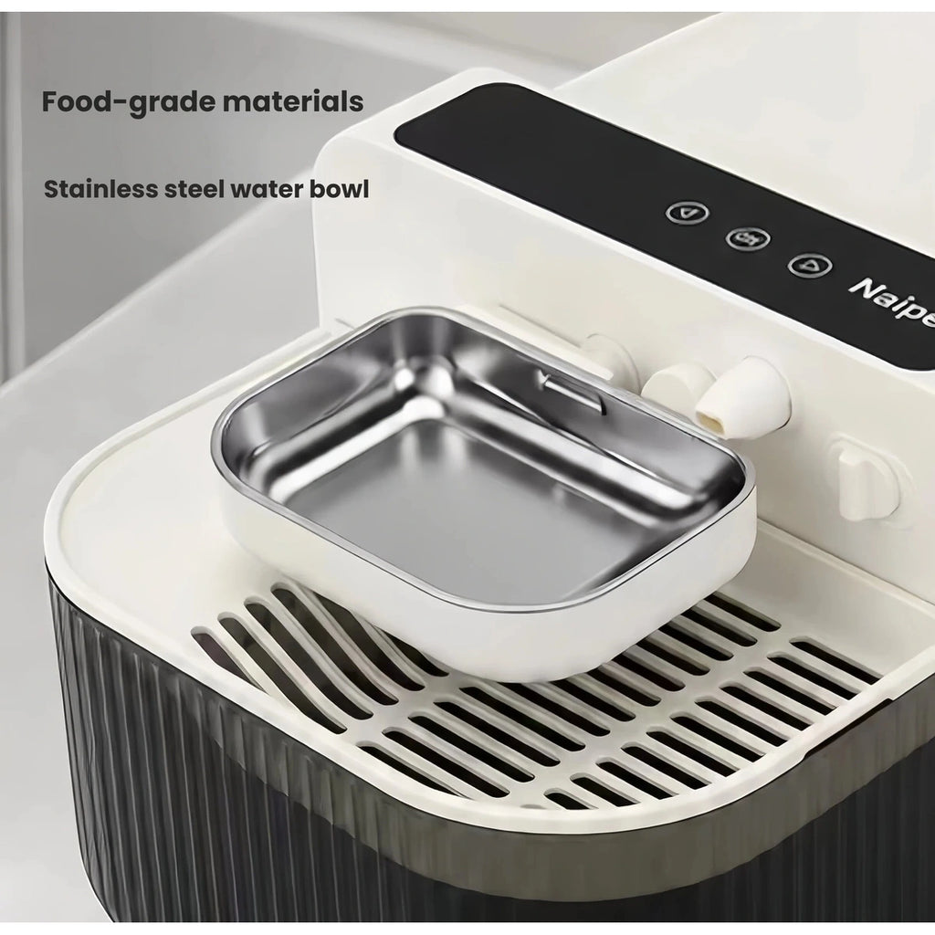 Close-up of the Naipet stainless steel bowl and water outlet