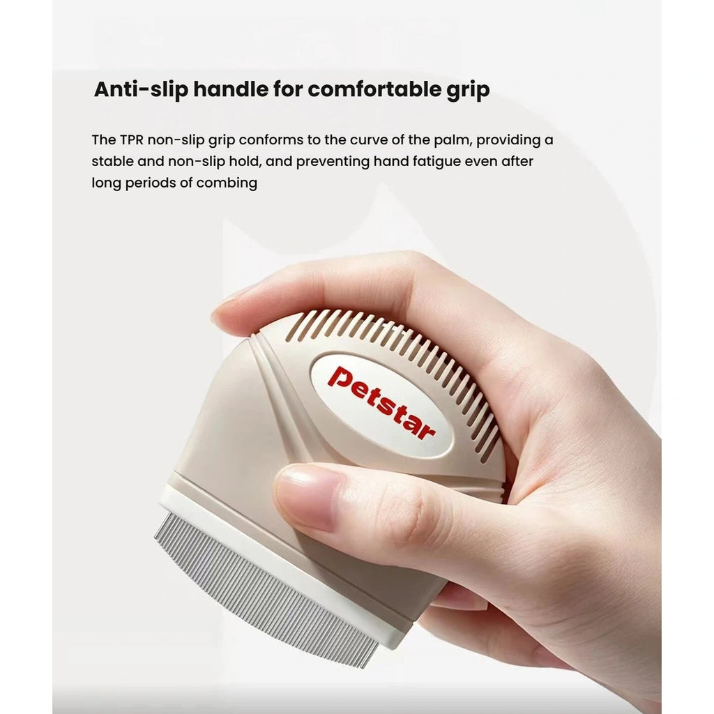 Hand holding the Petstar comb’s shaped non-slip grip