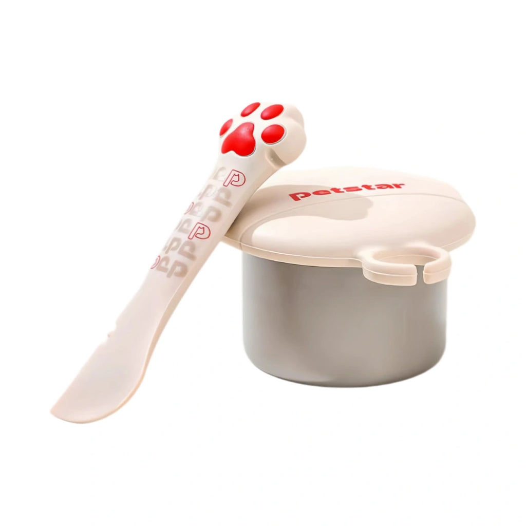 Petstar paw-handled food scoop beside a pet food can with silicone lid