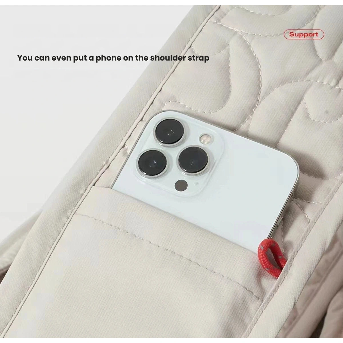Phone stored in the pocket on the Petstar padded shoulder strap