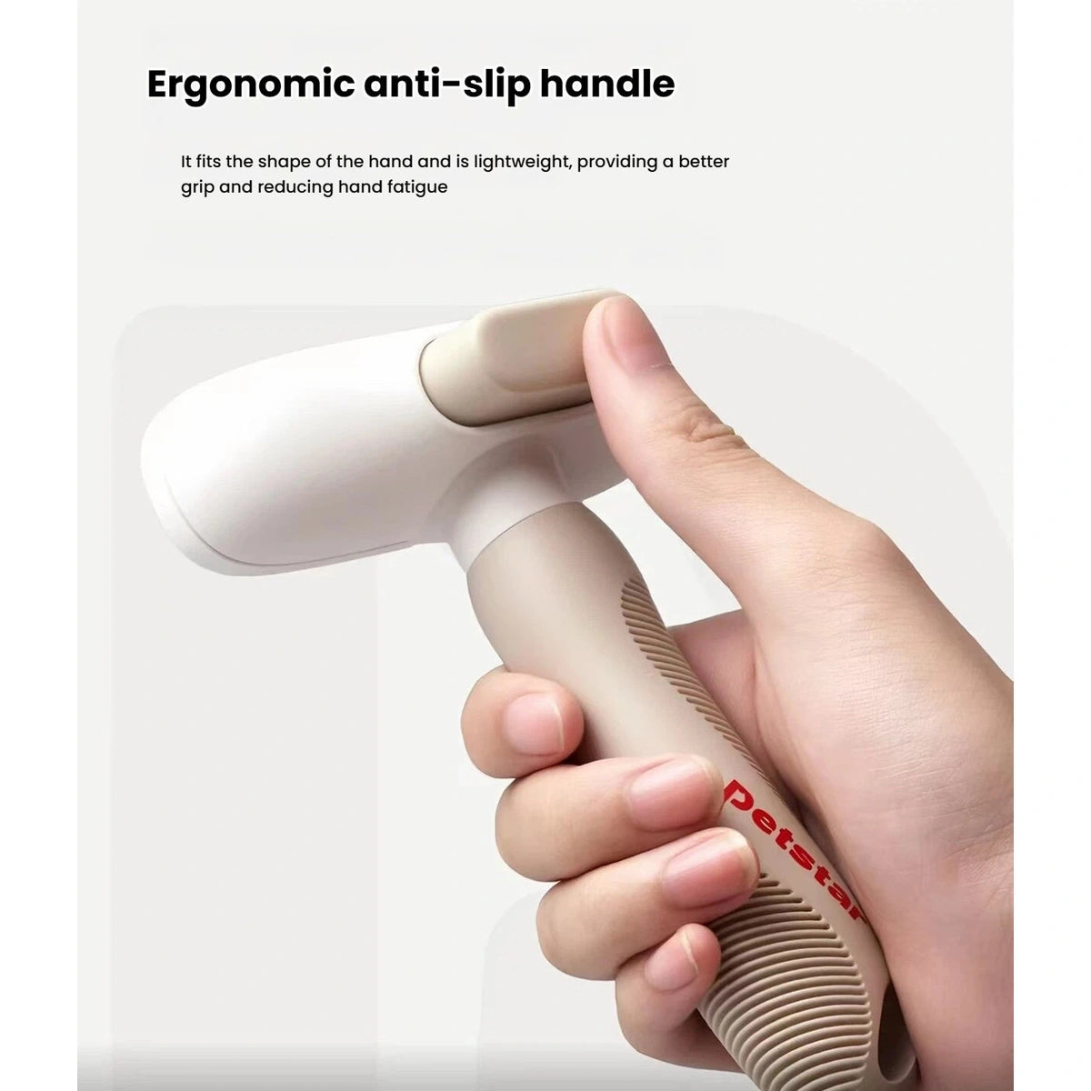 Hand holding the textured Petstar deshedding comb handle