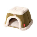 Petstar green heated cat house with cream trim and an arched front entrance