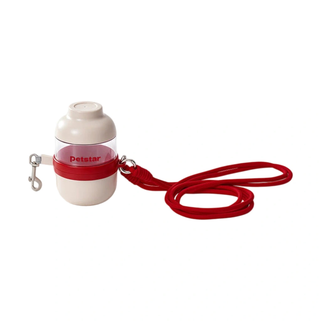 Red Petstar retractable dog lead with integrated food and water containers