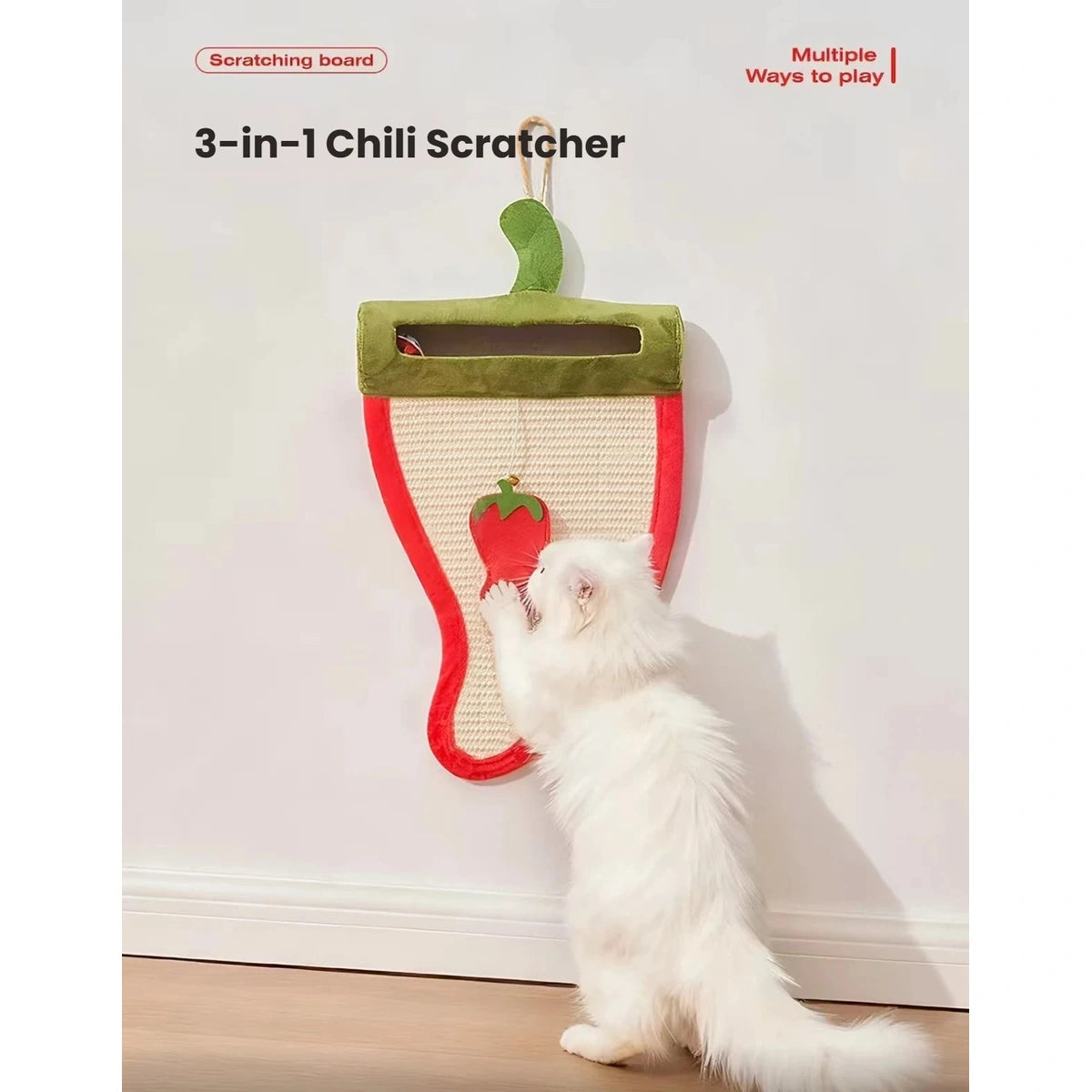 White cat stretching up to play with the hanging scratcher